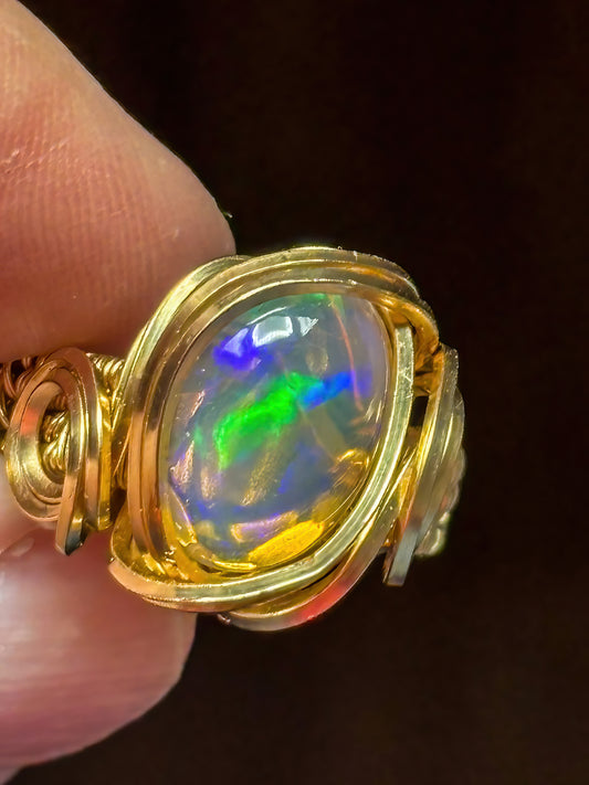 Gorgeous Clear Opal with Multi Color Flash wrapped in 14K gold filled wire, Size 6
