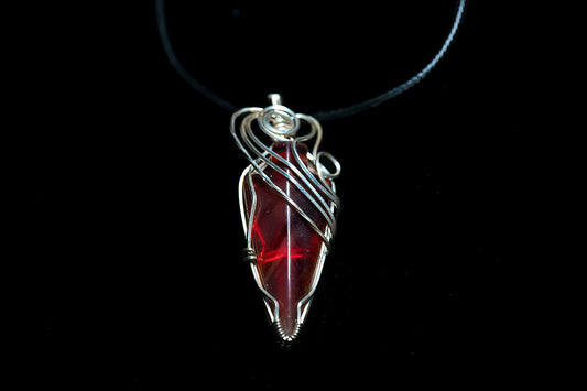 Stunning carnelian arrow wrapped in twisted .925 sterling silver