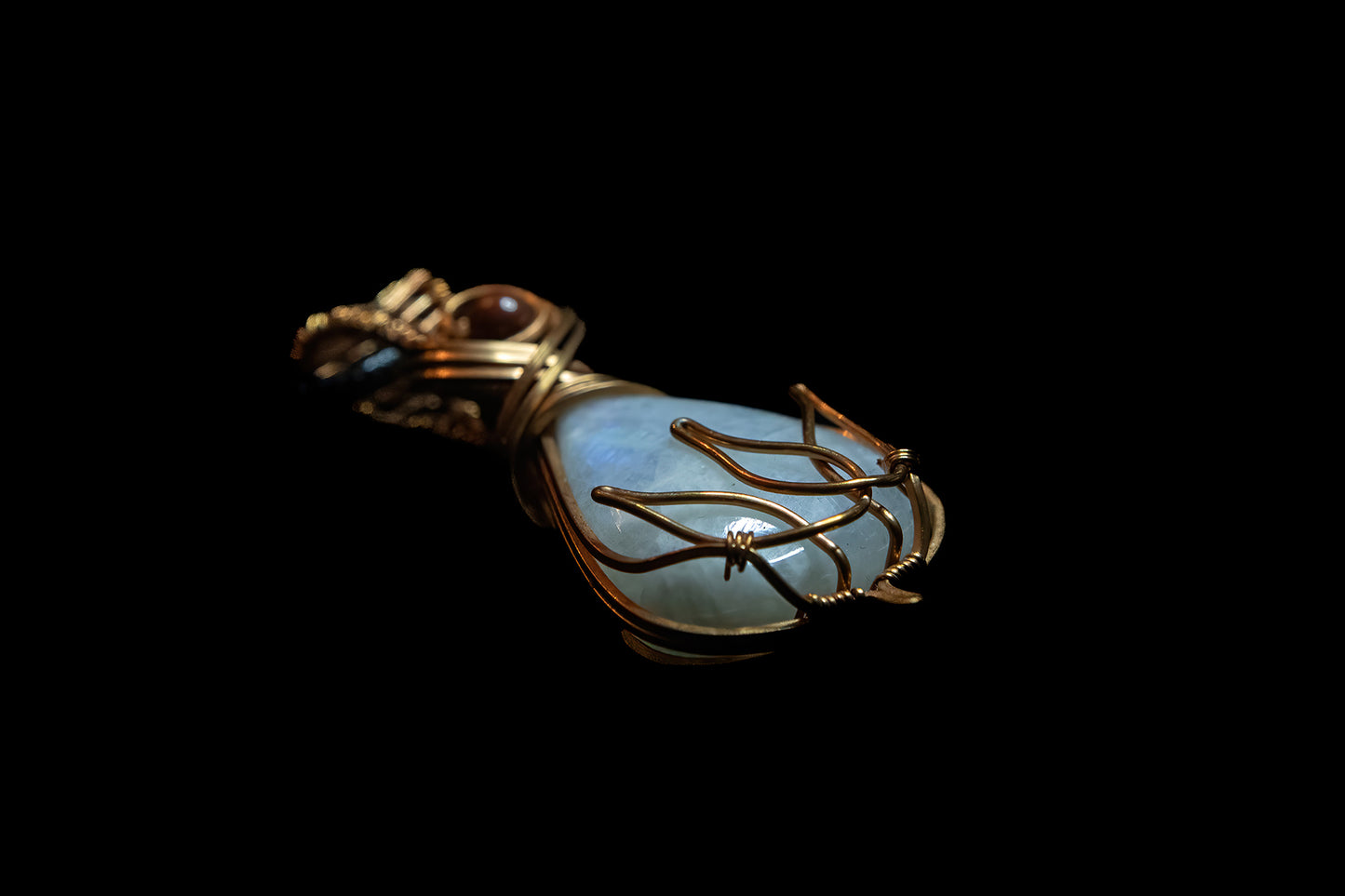 Moonstone and Dragon's Blood wrapped in Fine Copper
