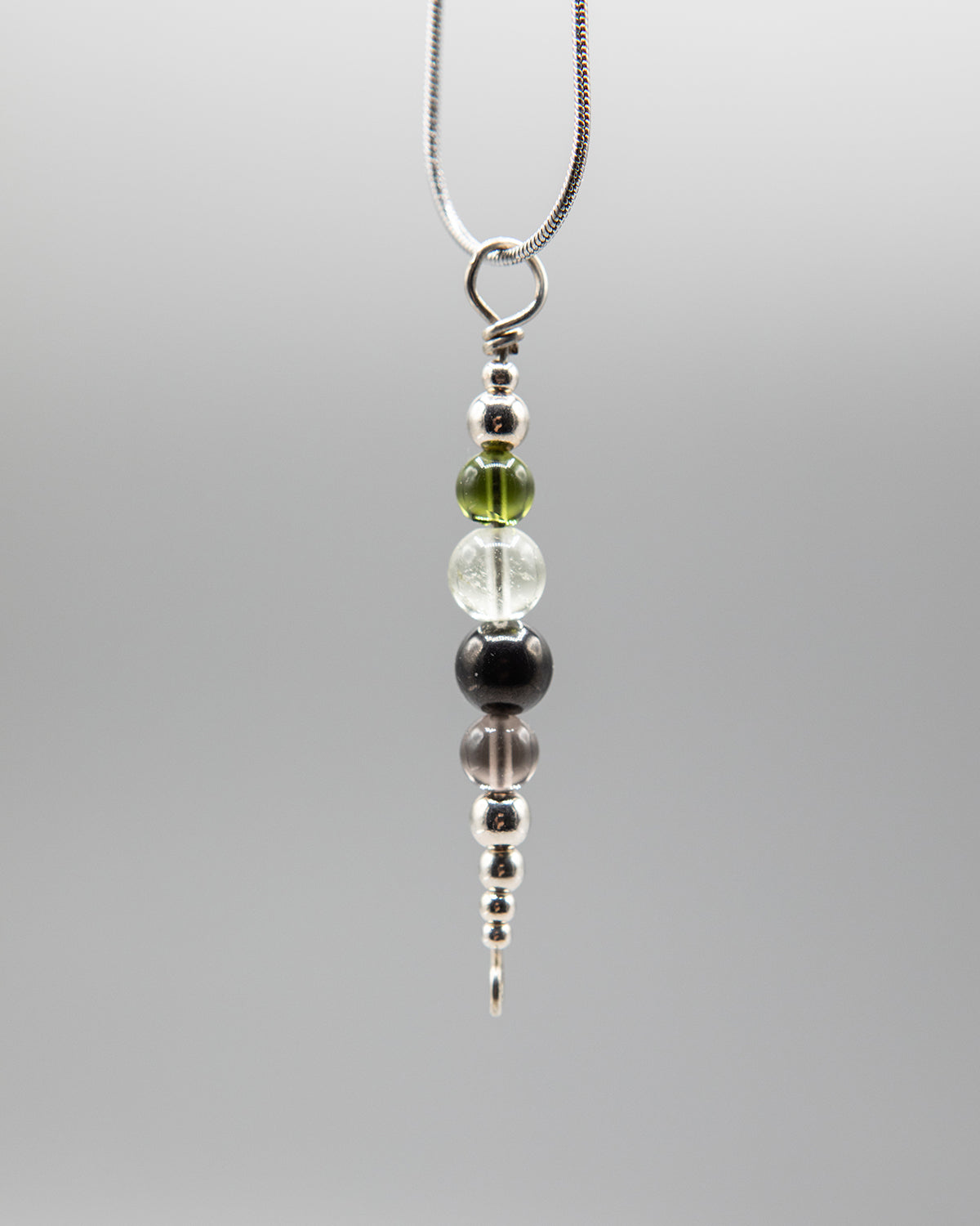 Power and Transformation Pendant in Silver