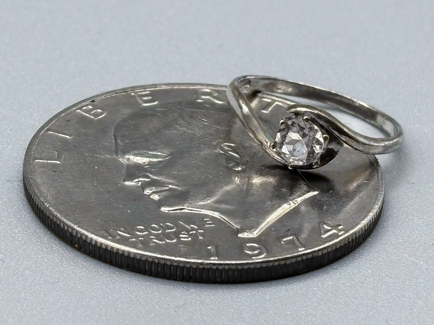 5mm Pink Morganite Facet set in a sterling silver bypass ring setting, Size 7