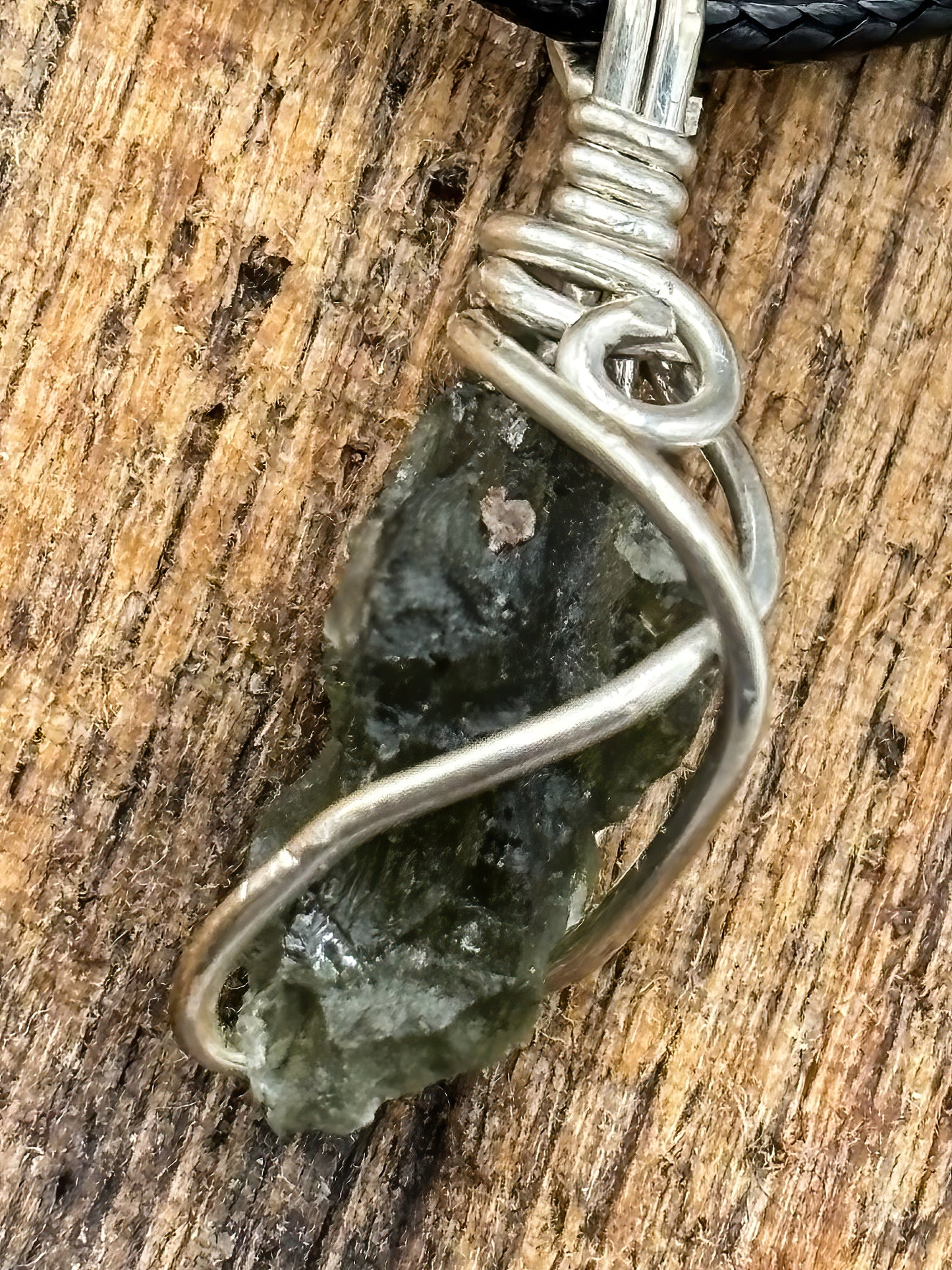 Tiny Bit of Czech Moldavite wrapped in Sterling Silver