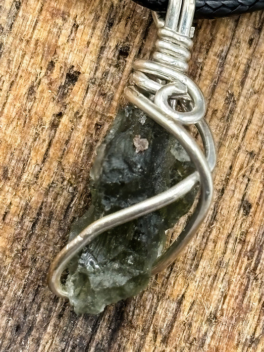 Tiny Bit of Czech Moldavite wrapped in Sterling Silver