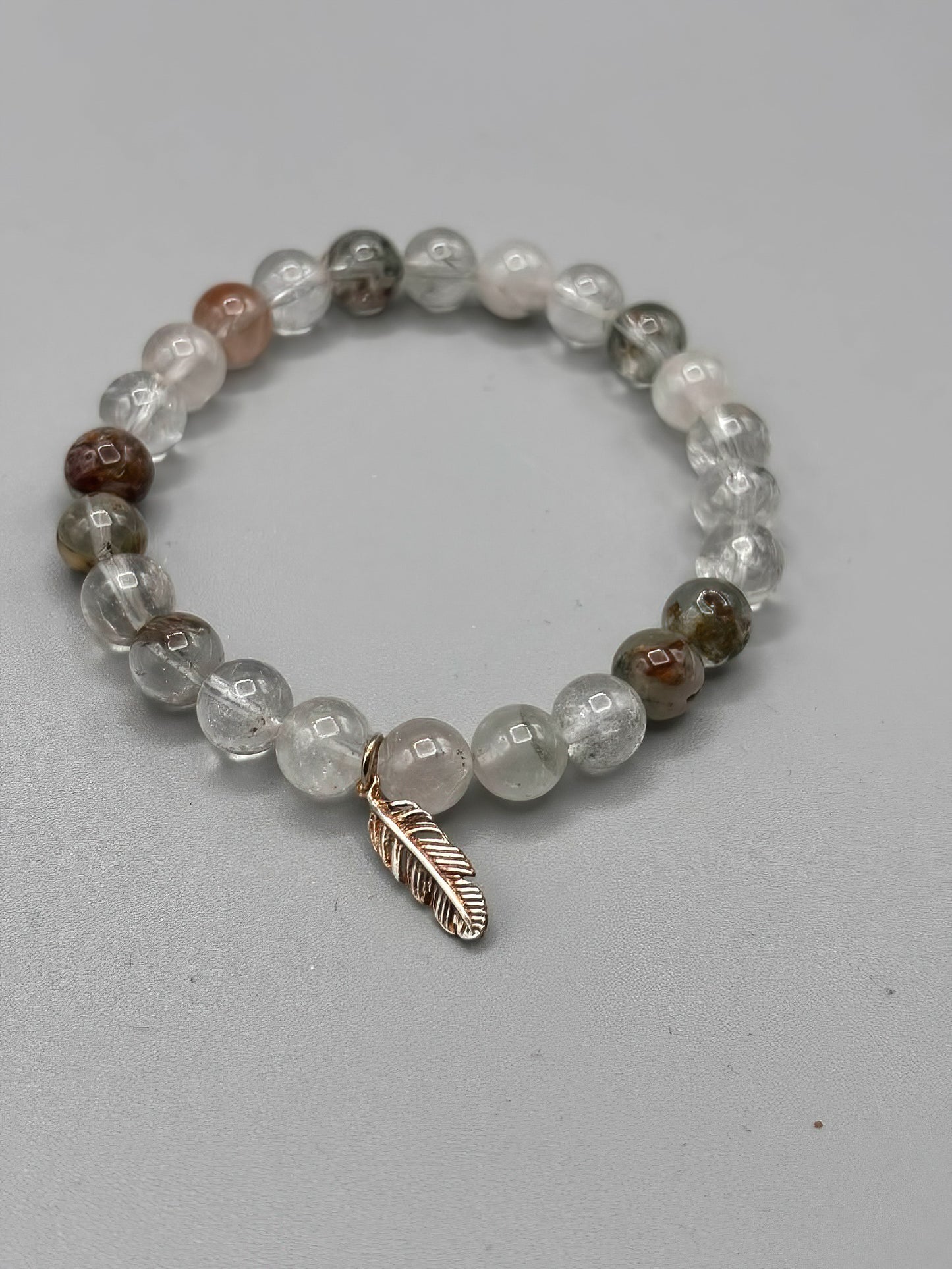Rutile Quartz beaded bracelet with Oxidized Sterling silver feather charm
