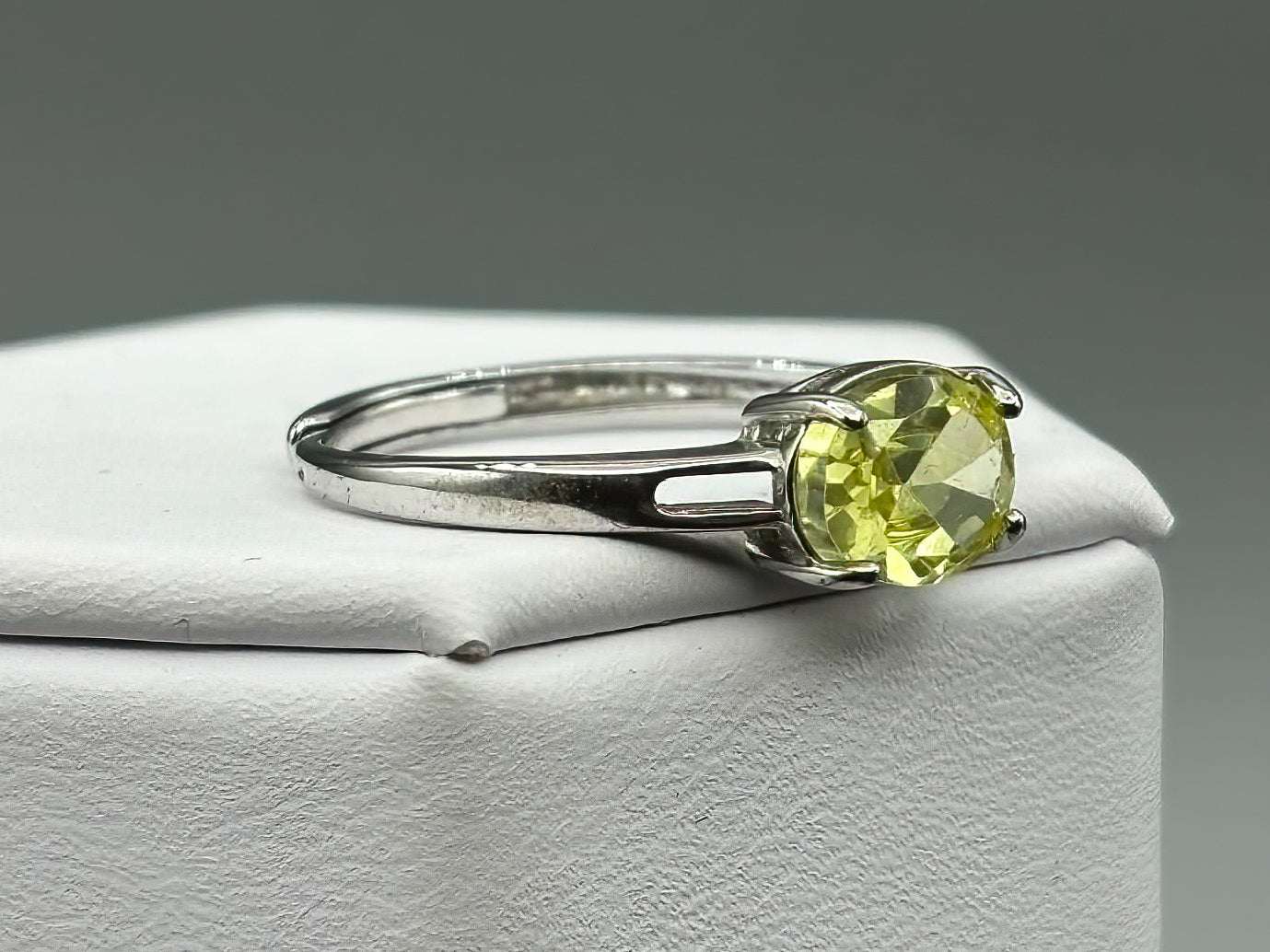 Yellow Green Cubic Zirconia set in adjustable sterling silver band