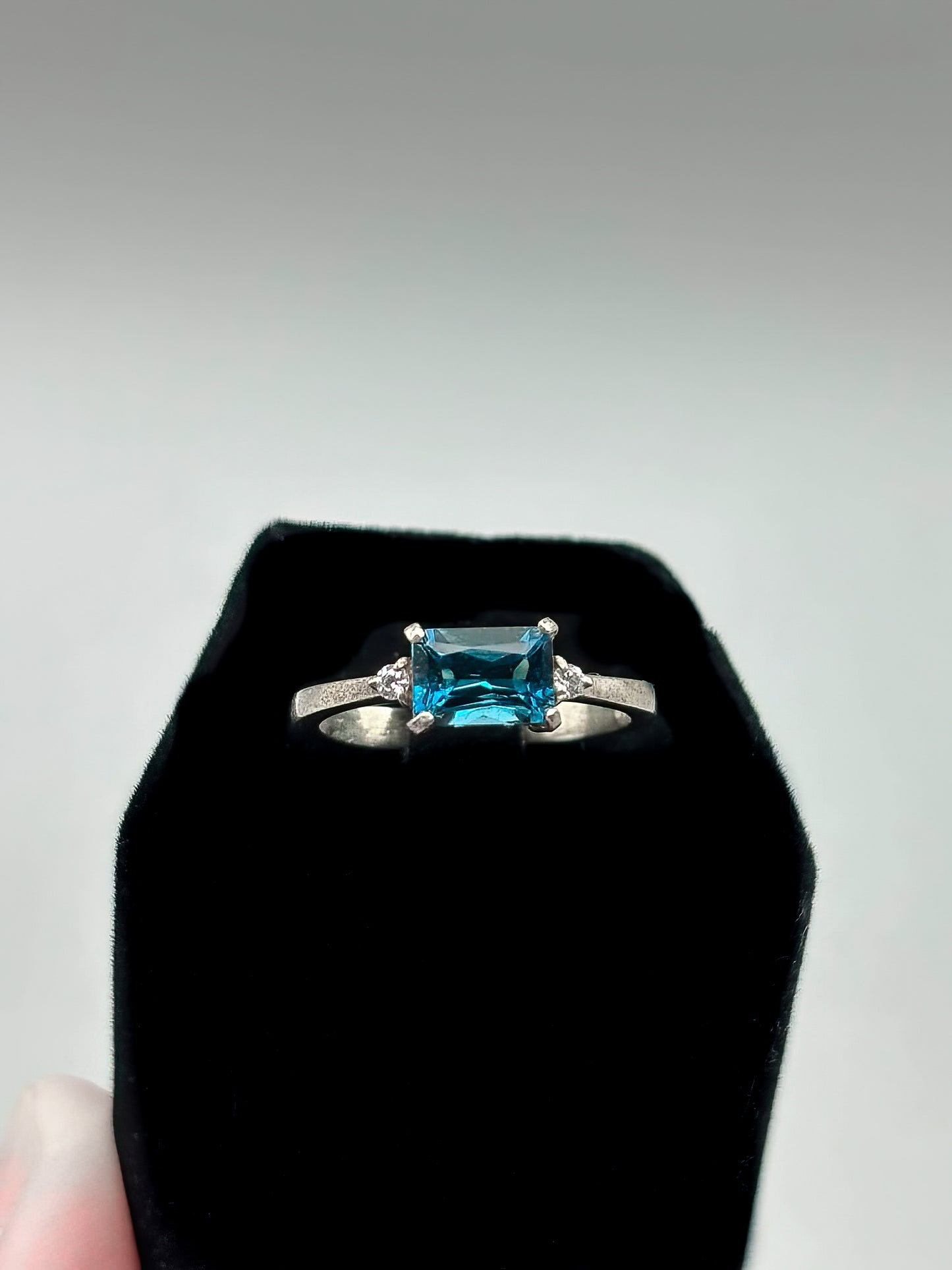 Rectangle London Blue Topaz and small CZ set in Sterling Silver, Size 6.5
