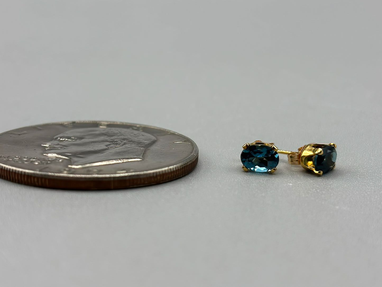 Oval London Blue Topaz set in 14K gold fill posts