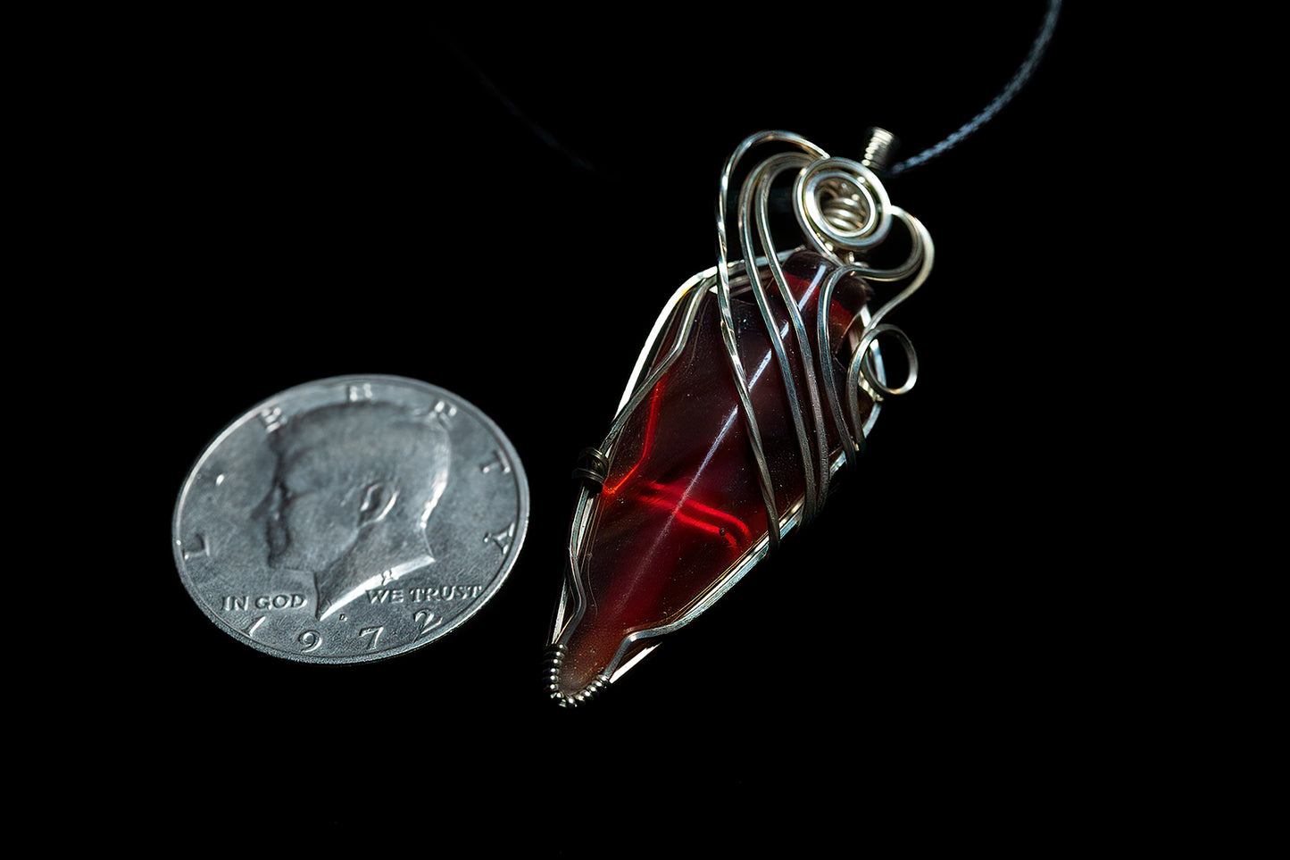 Stunning carnelian arrow wrapped in twisted .925 sterling silver