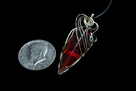 Stunning carnelian arrow wrapped in twisted .925 sterling silver