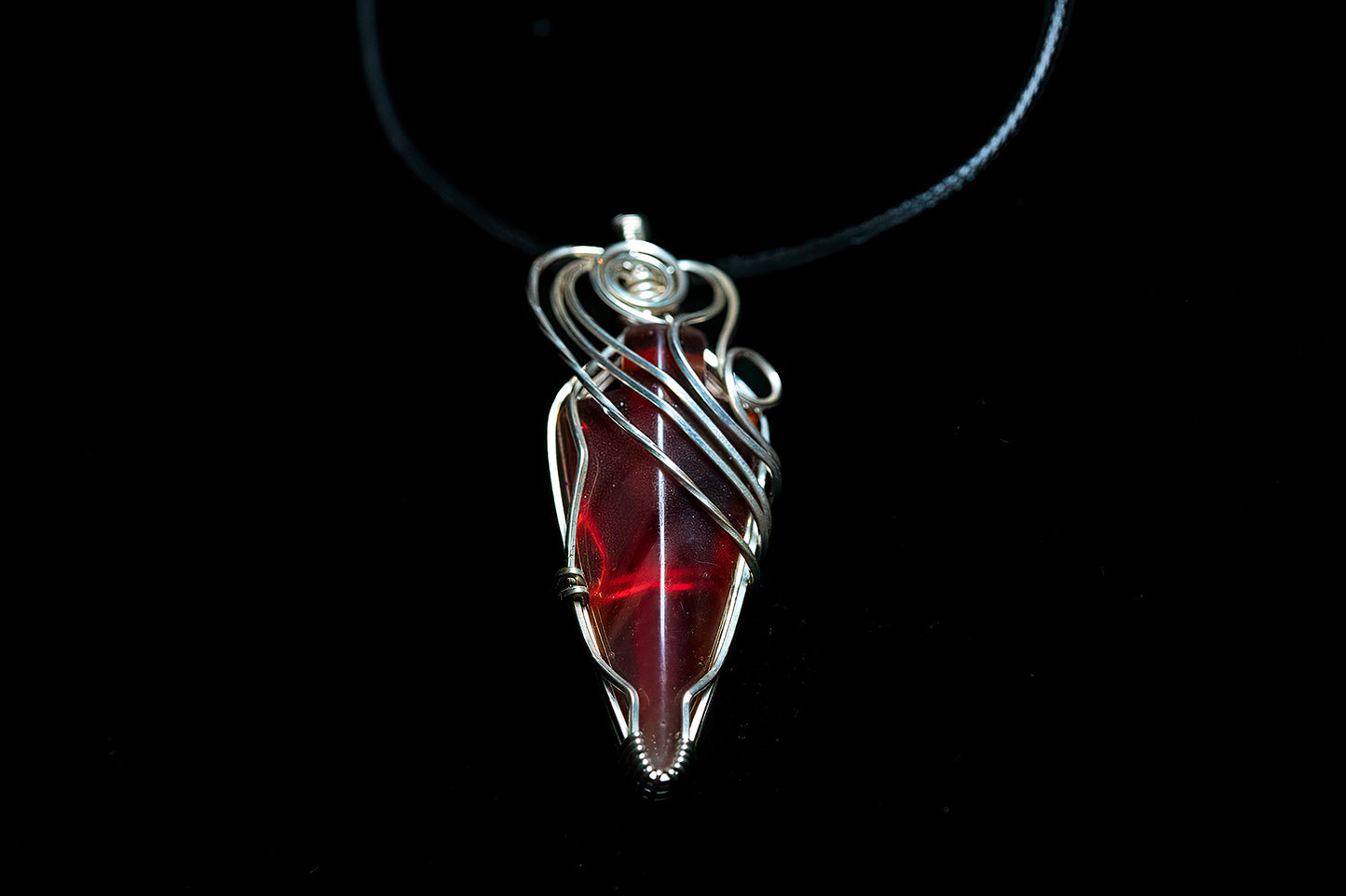 Stunning carnelian arrow wrapped in twisted .925 sterling silver