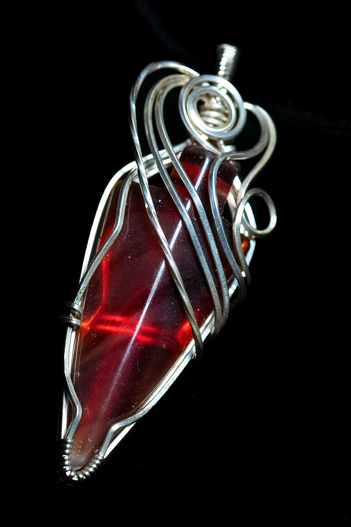 Stunning carnelian arrow wrapped in twisted .925 sterling silver