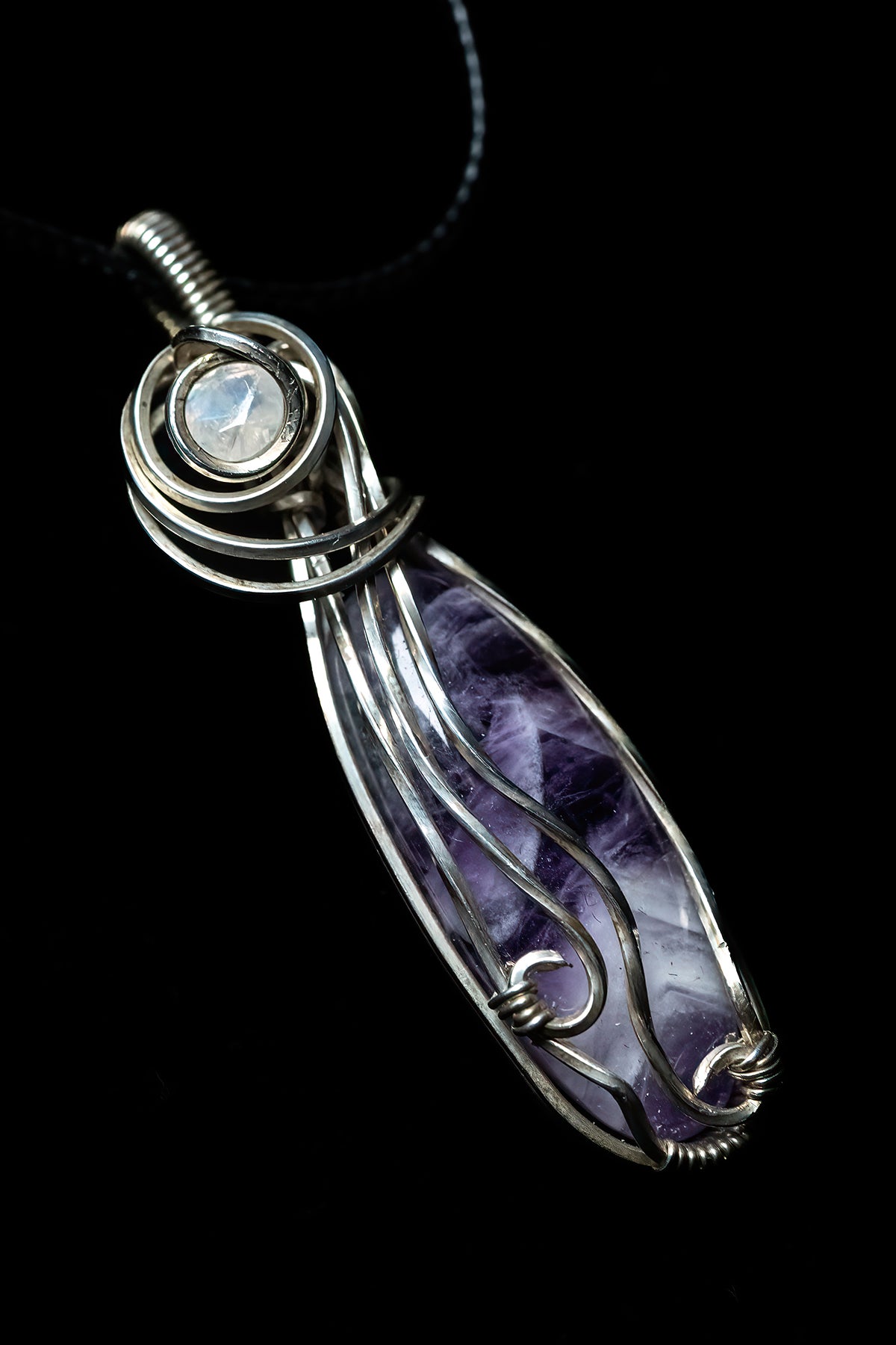 Chevron Amethyst with Faceted Moonstone Accent wrapped in Sterling Silver