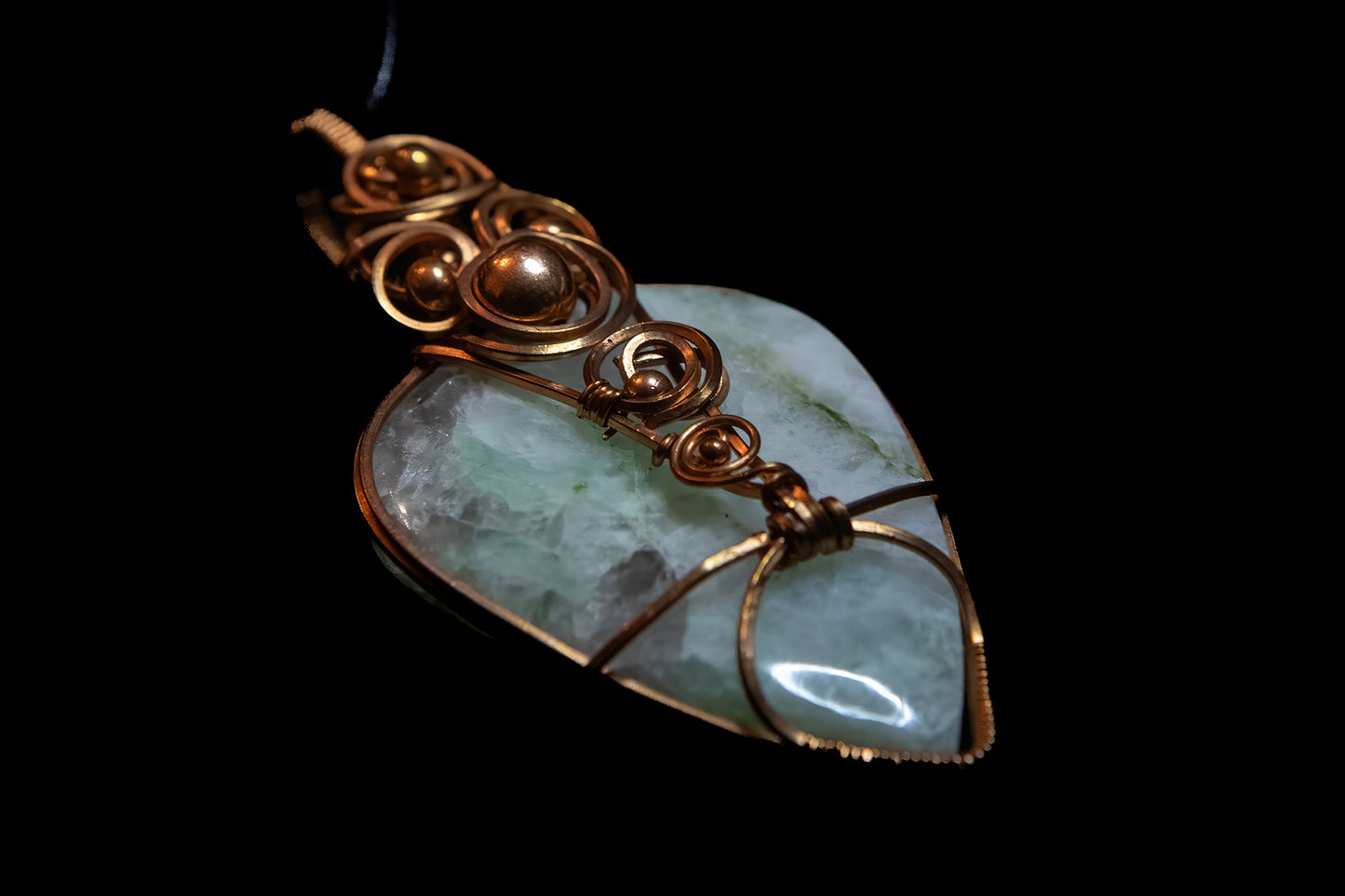 Gorgeous Green Moonstone wrapped in Fine Copper