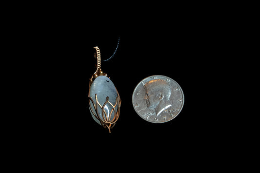 Tourmaline Moonstone in Fine Copper Lotus Cage
