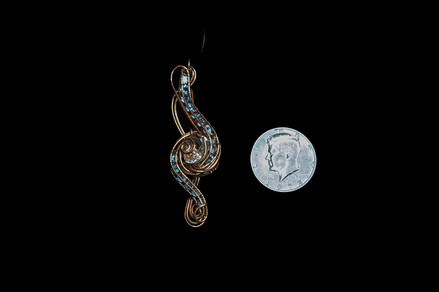 Blue and White Topaz wrapped in Fine Copper