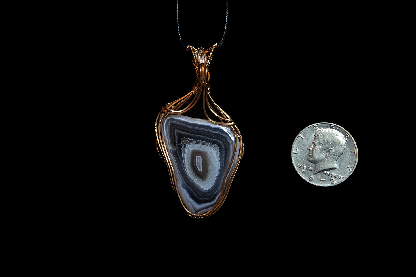Pink and Purple Botswana Agate with White Topaz Accent wrapped in Fine Copper