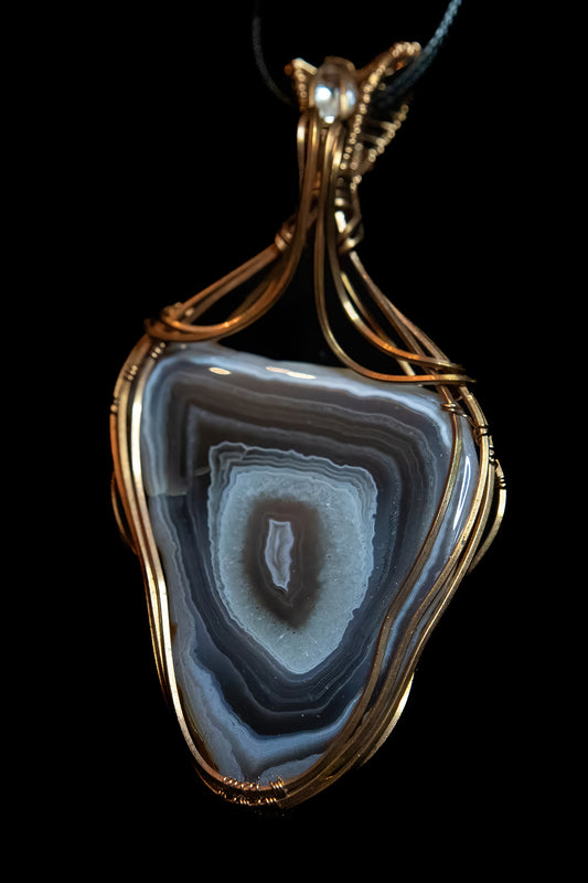 Pink and Purple Botswana Agate with White Topaz Accent wrapped in Fine Copper