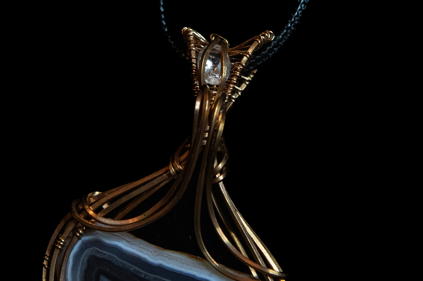 Pink and Purple Botswana Agate with White Topaz Accent wrapped in Fine Copper