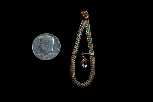 Yellow Labradorite Facet Swinging Freely from Copper and Silver Woven Frame