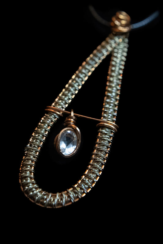 Yellow Labradorite Facet Swinging Freely from Copper and Silver Woven Frame
