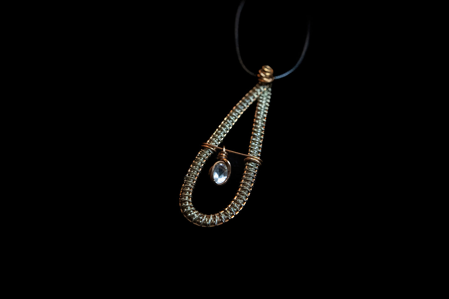 Yellow Labradorite Facet Swinging Freely from Copper and Silver Woven Frame