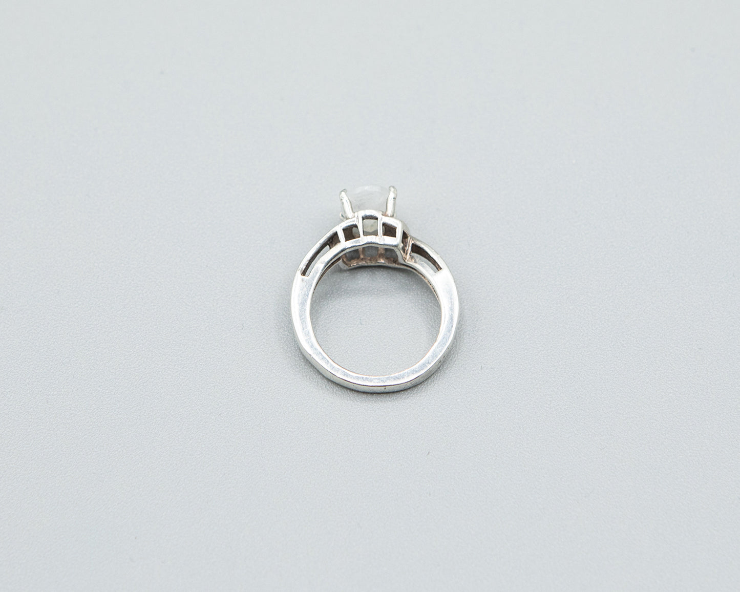 Moonstone with pale pink flash, sterling band