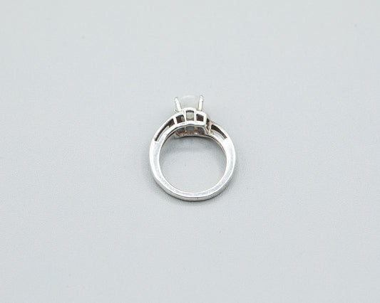 Moonstone with pale pink flash, sterling band