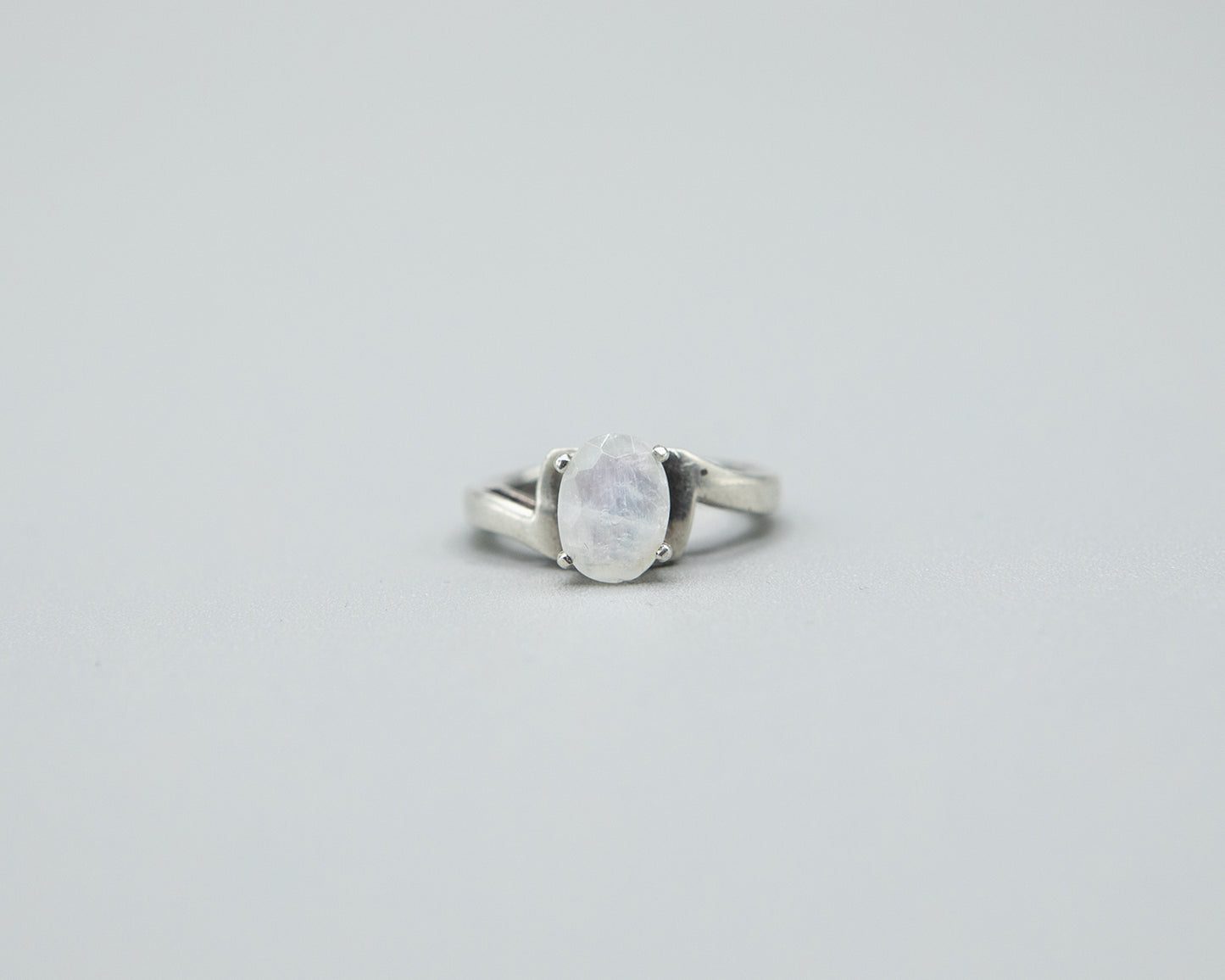 Moonstone with pale pink flash, sterling band