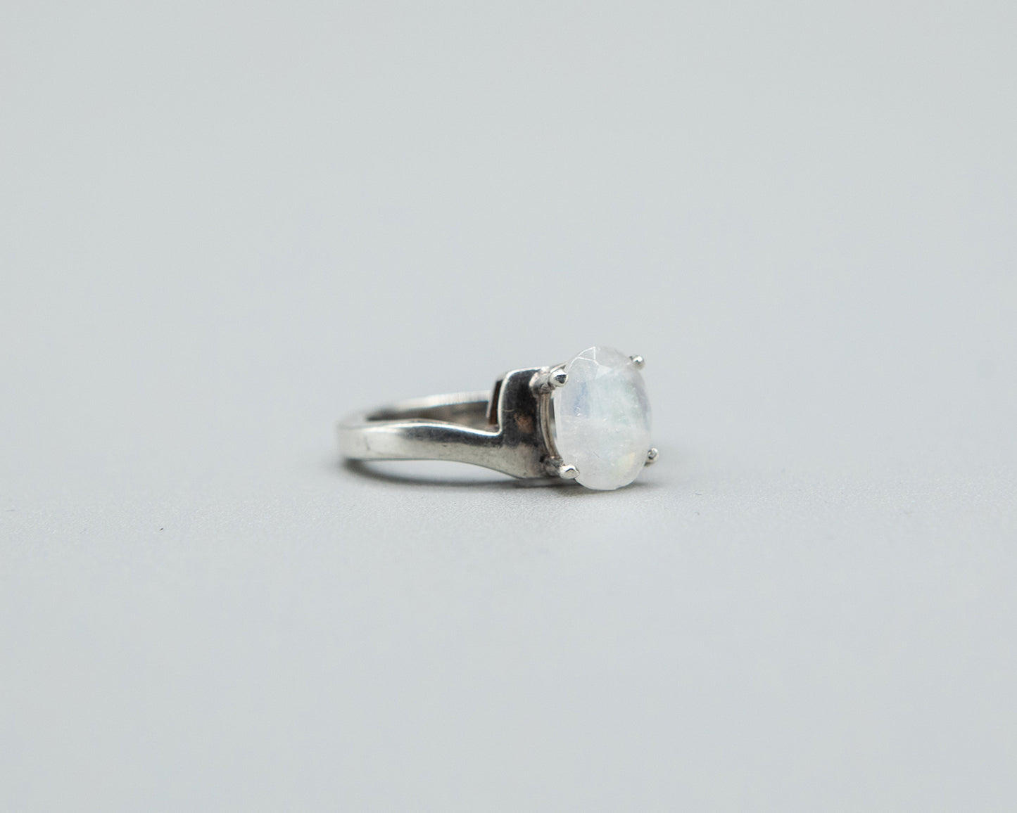 Moonstone with pale pink flash, sterling band