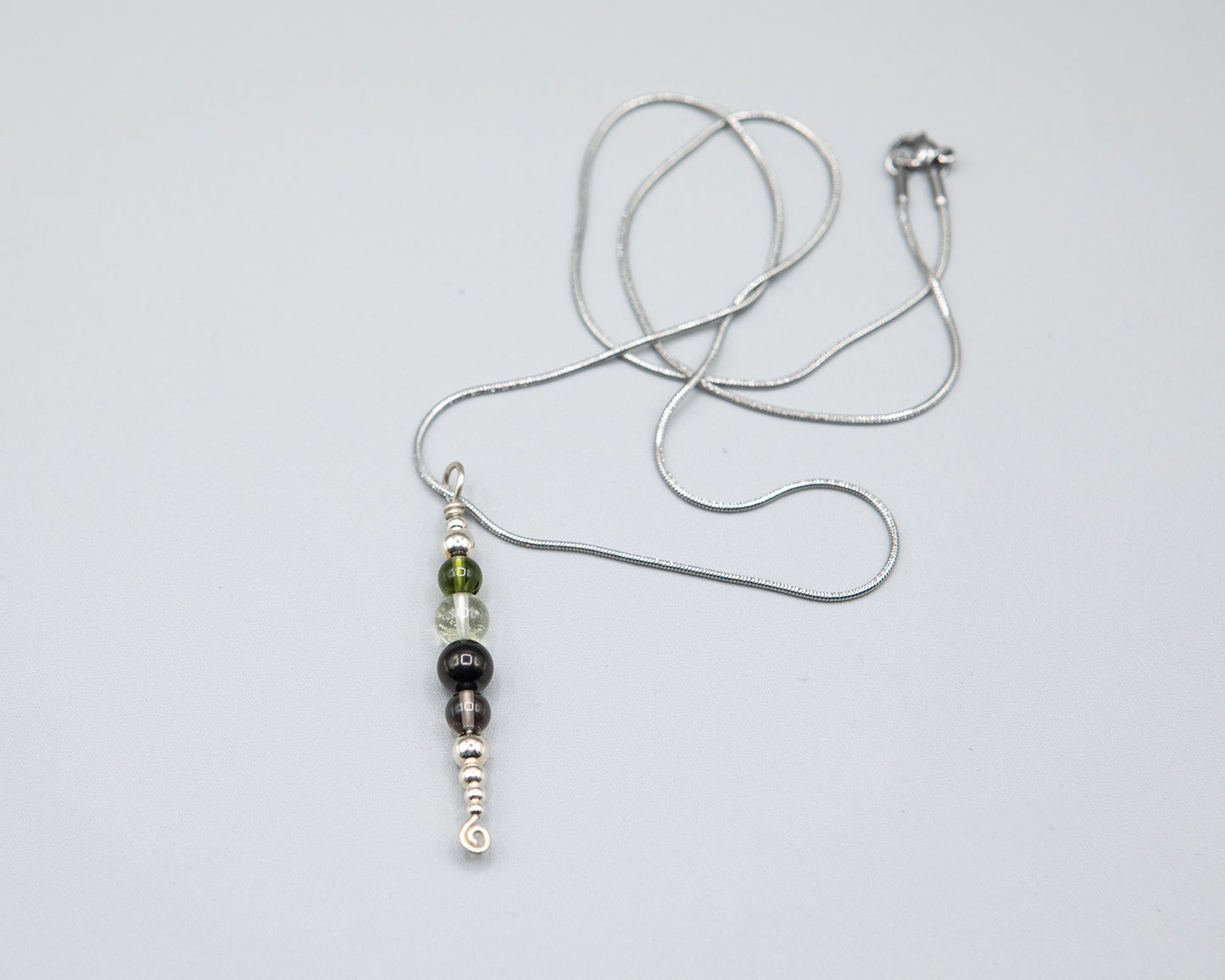 Power and Transformation Pendant in Silver