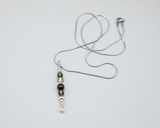 Power and Transformation Pendant in Silver