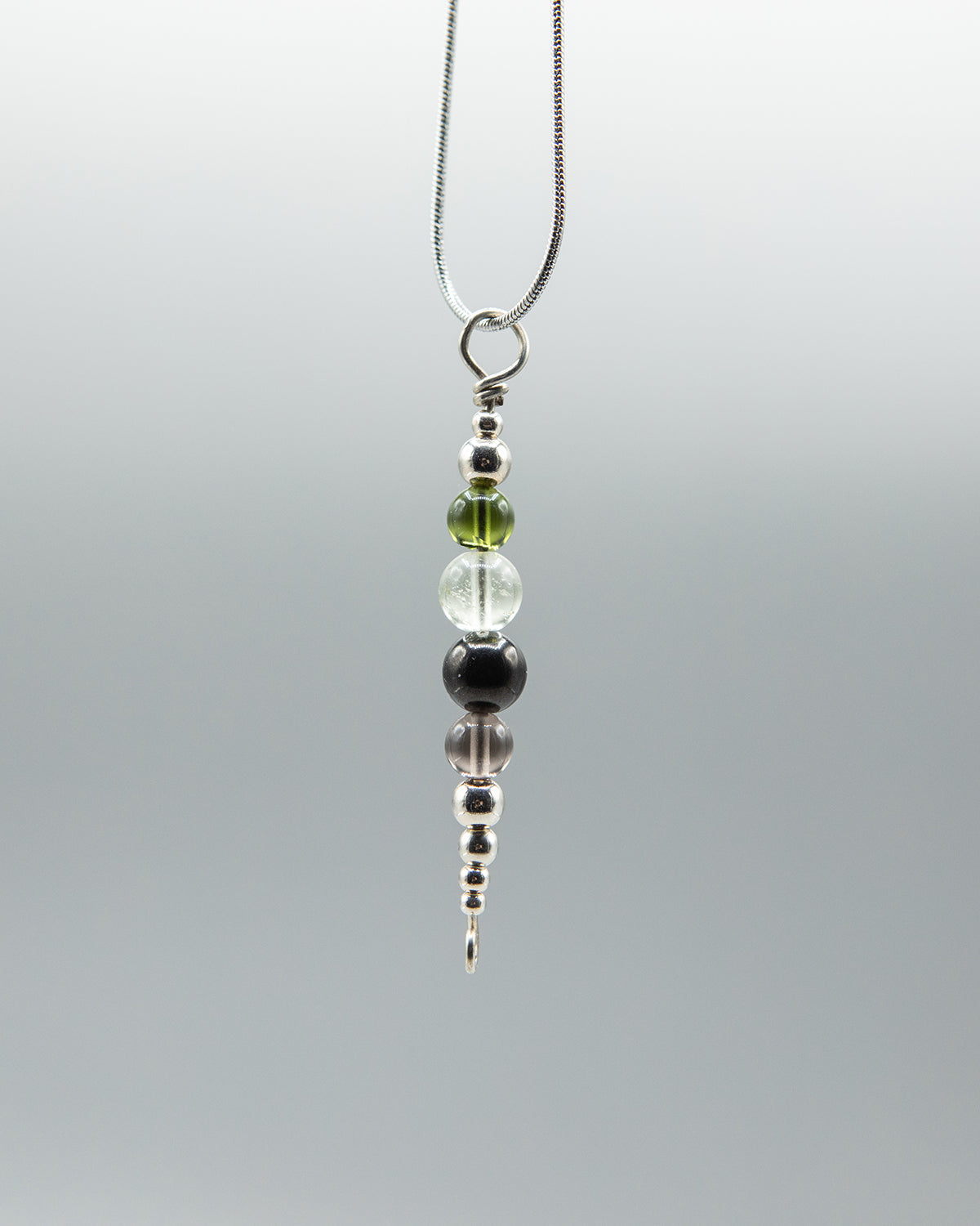 Power and Transformation Pendant in Silver