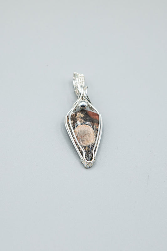 Gorgeous Galaxy Rhyolite wrapped in Sterling Silver