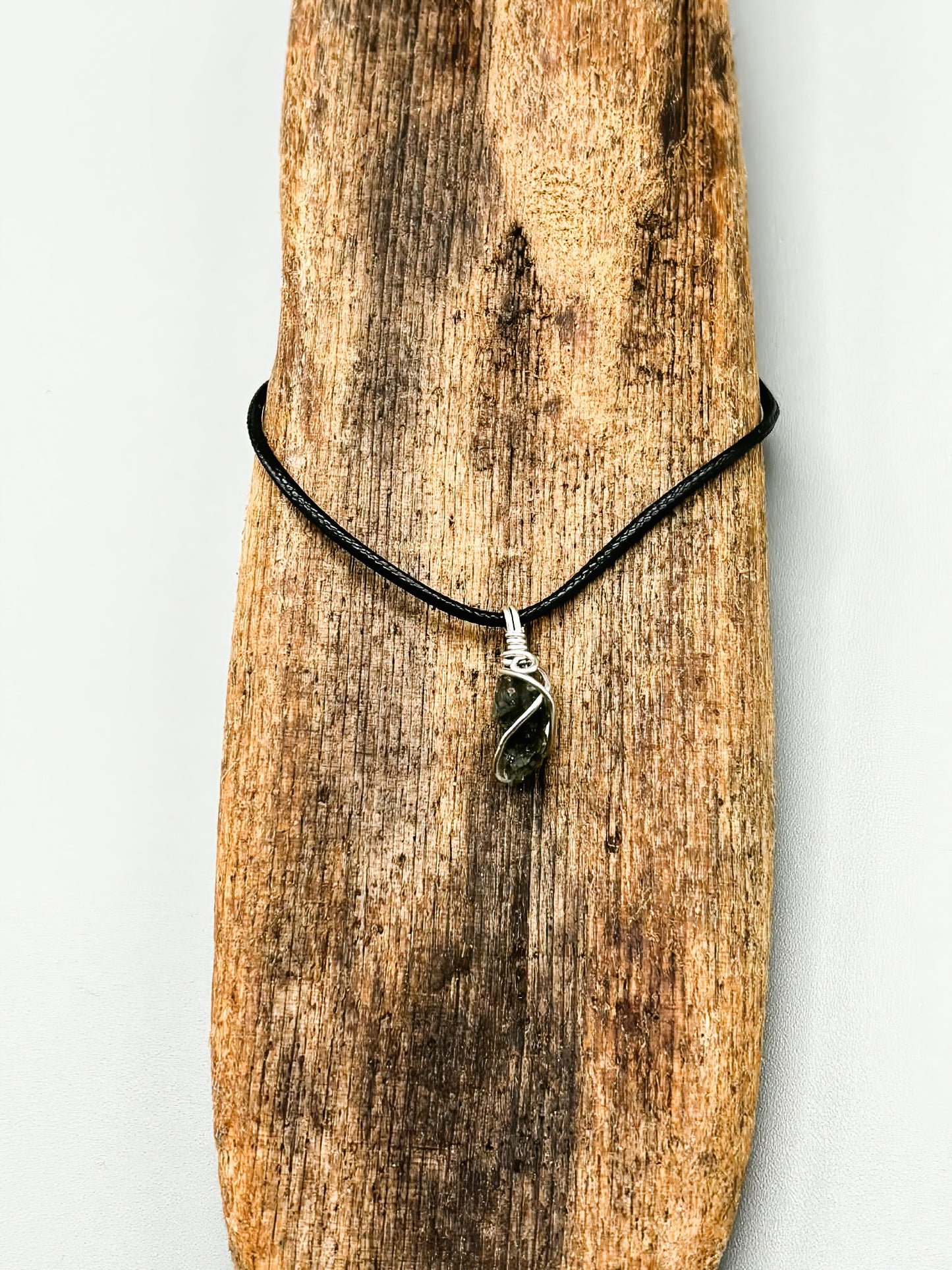 Tiny Bit of Czech Moldavite wrapped in Sterling Silver