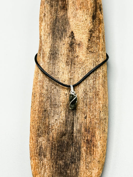 Tiny Bit of Czech Moldavite wrapped in Sterling Silver