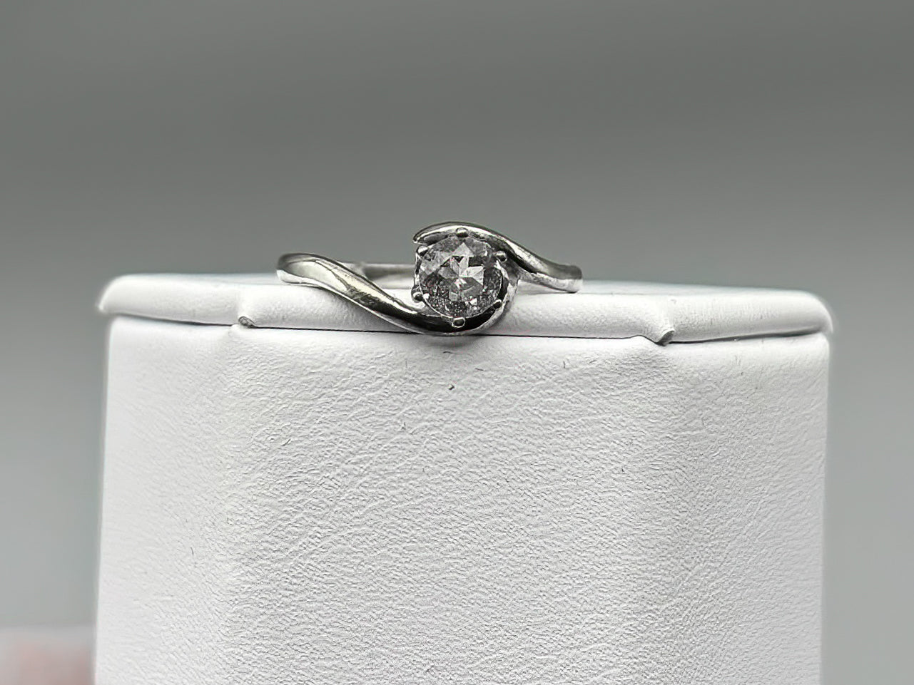 5mm Pink Morganite Facet set in a sterling silver bypass ring setting, Size 7