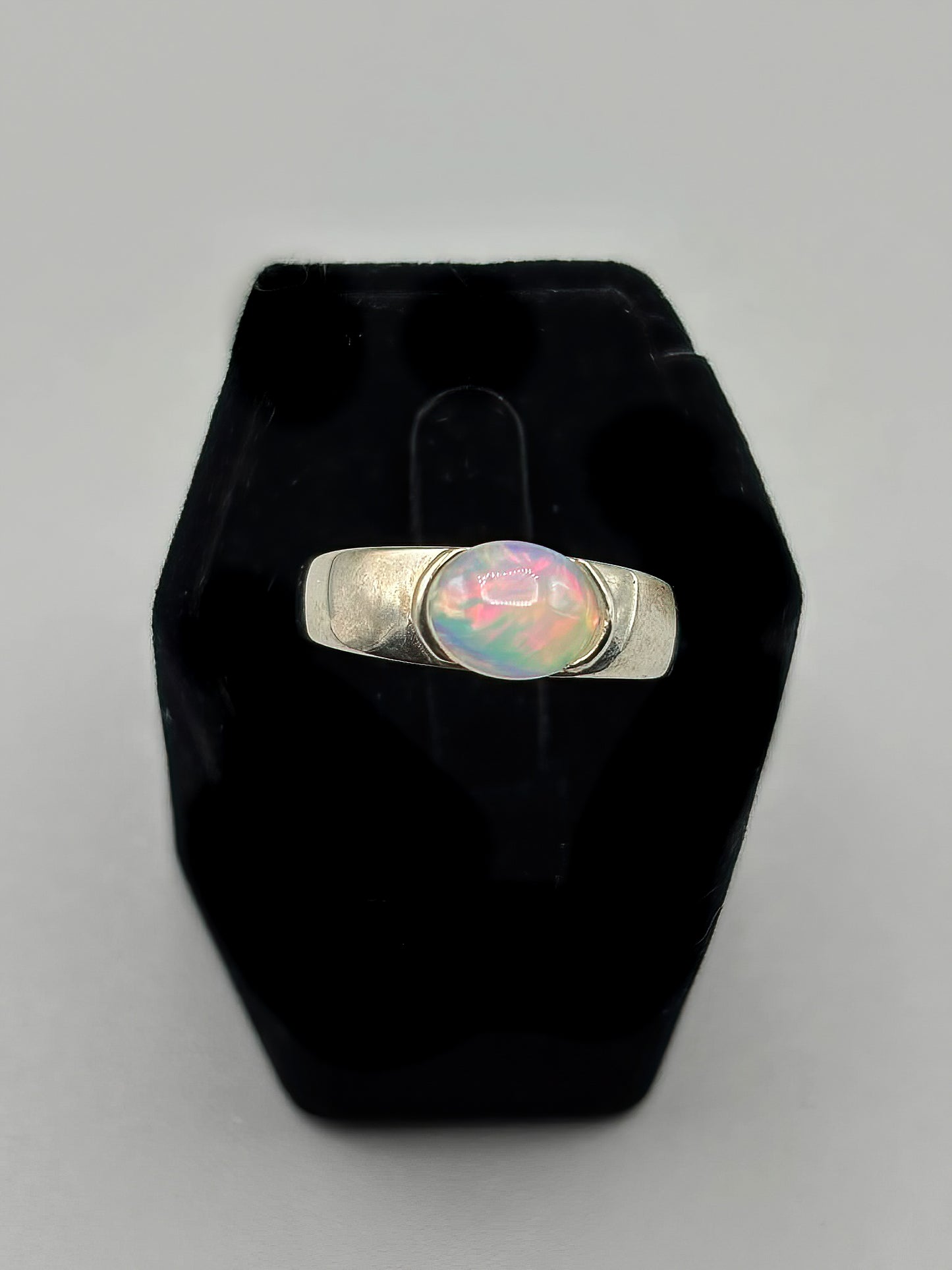 Oval Opal set in wide Sterling Silver Band, Size 8