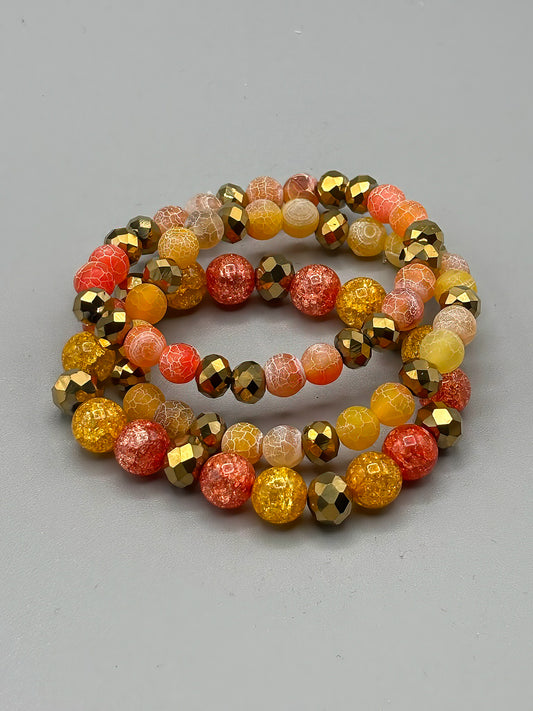 Set of 3 Glass Bead Bracelets in Orange and Gold
