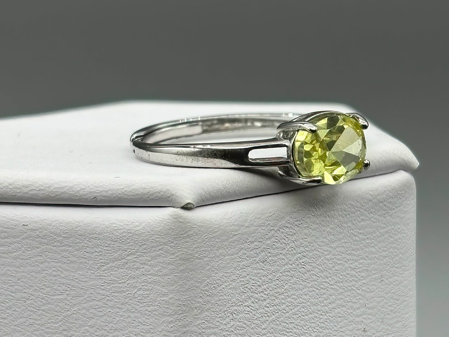 Yellow Green Cubic Zirconia set in adjustable sterling silver band