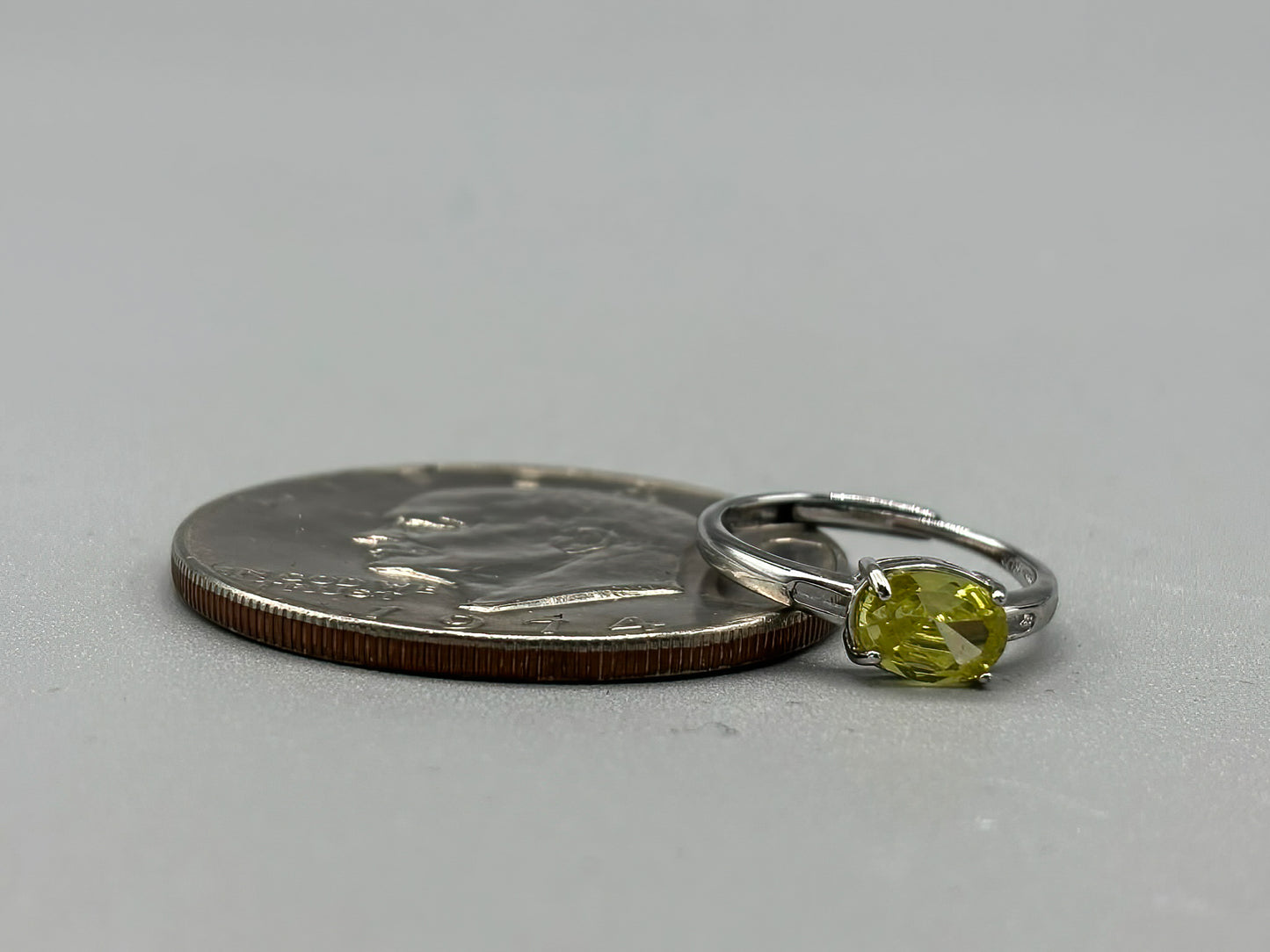 Yellow Green Cubic Zirconia set in adjustable sterling silver band