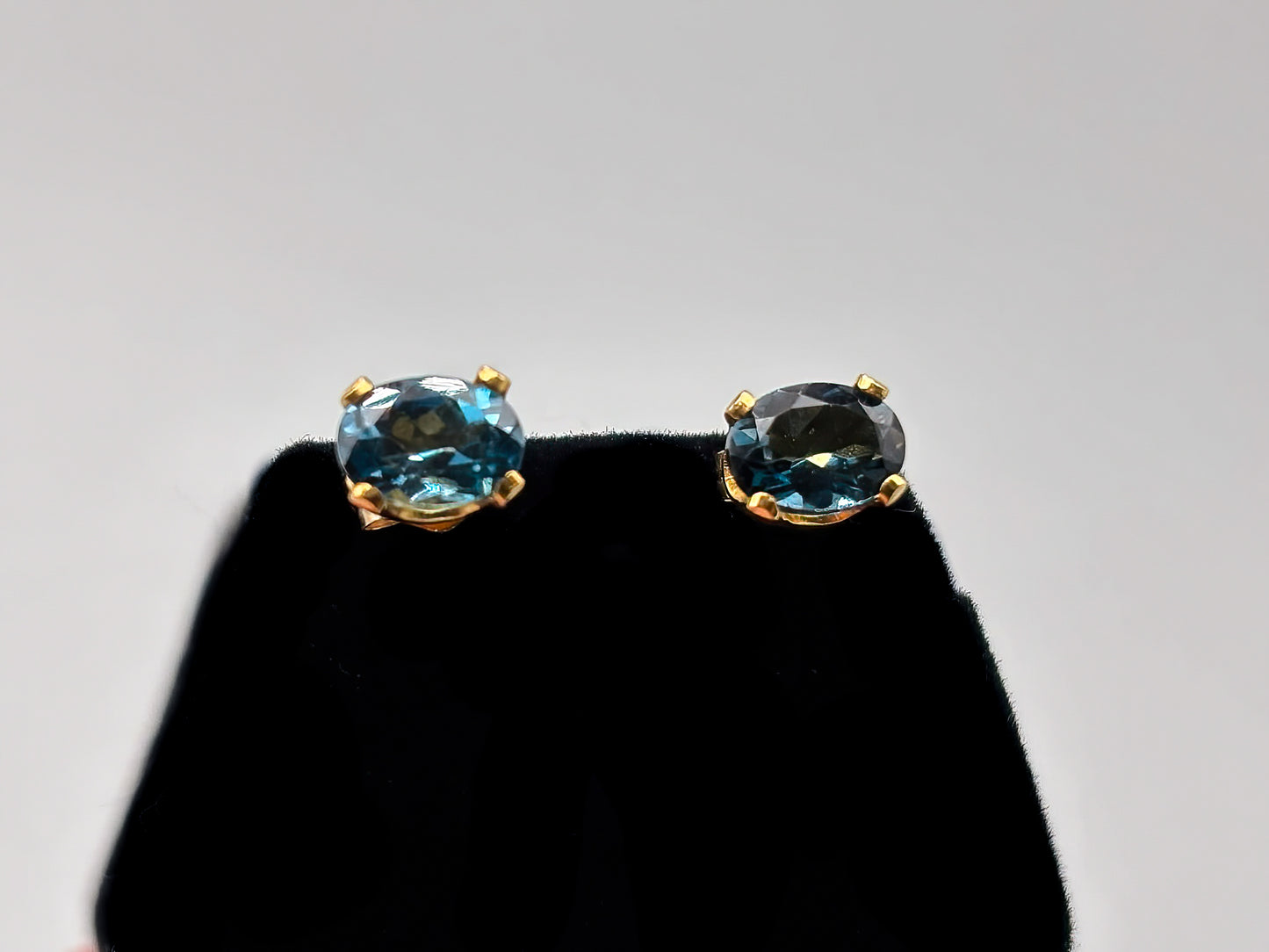 Oval London Blue Topaz set in 14K gold fill posts