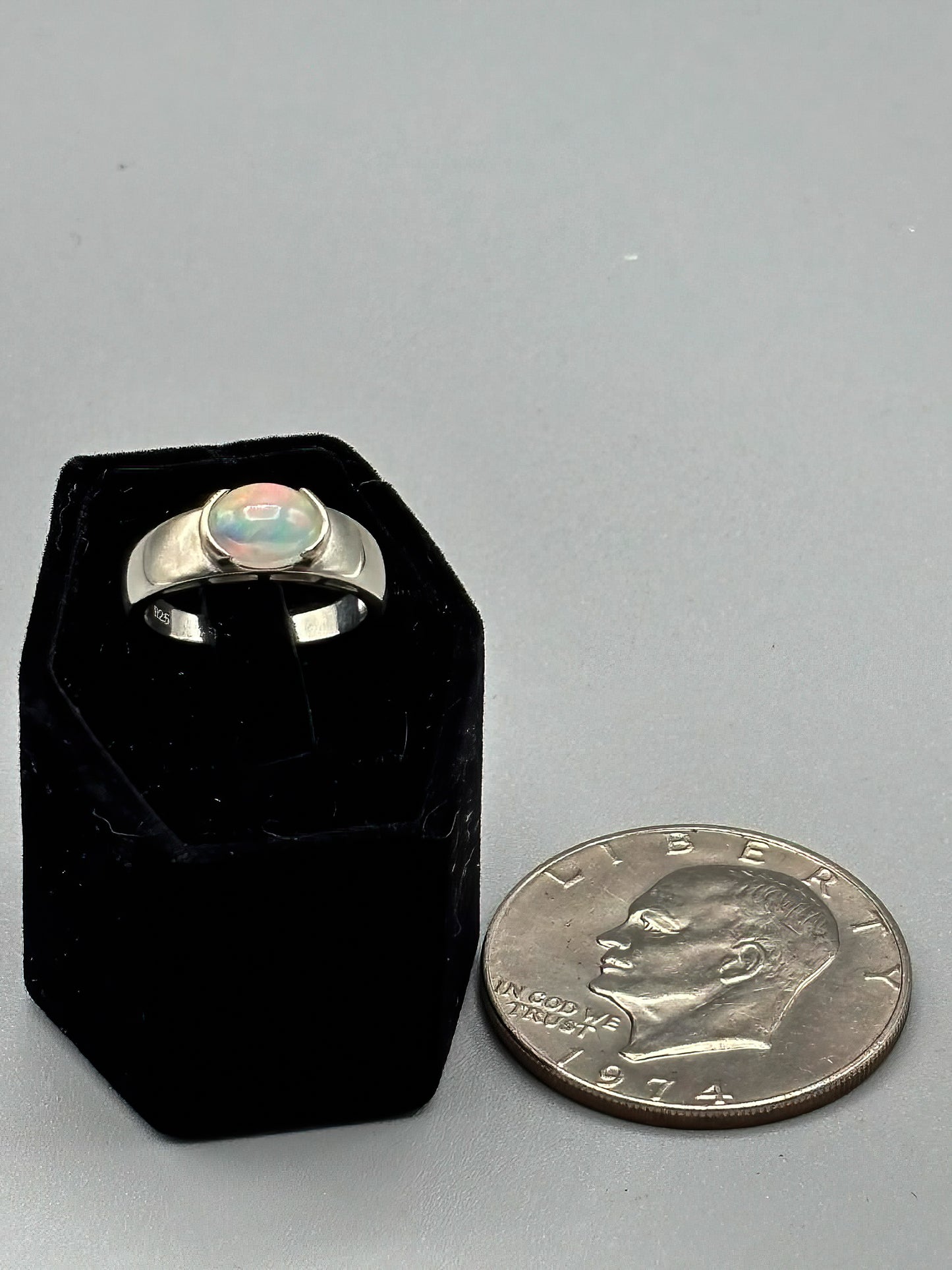 Oval Opal set in wide Sterling Silver Band, Size 8