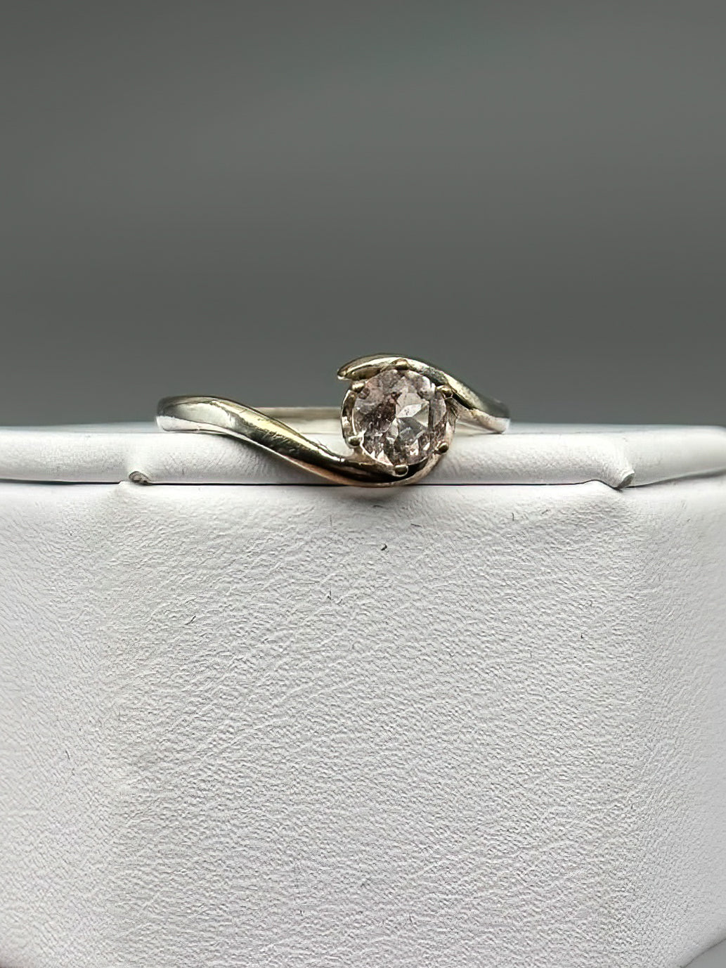 5mm Pink Morganite Facet set in a sterling silver bypass ring setting, Size 7