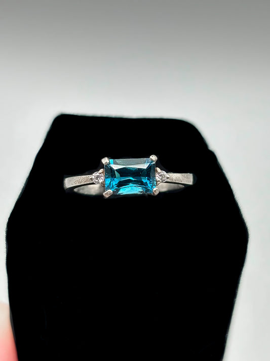 Rectangle London Blue Topaz and small CZ set in Sterling Silver, Size 6.5