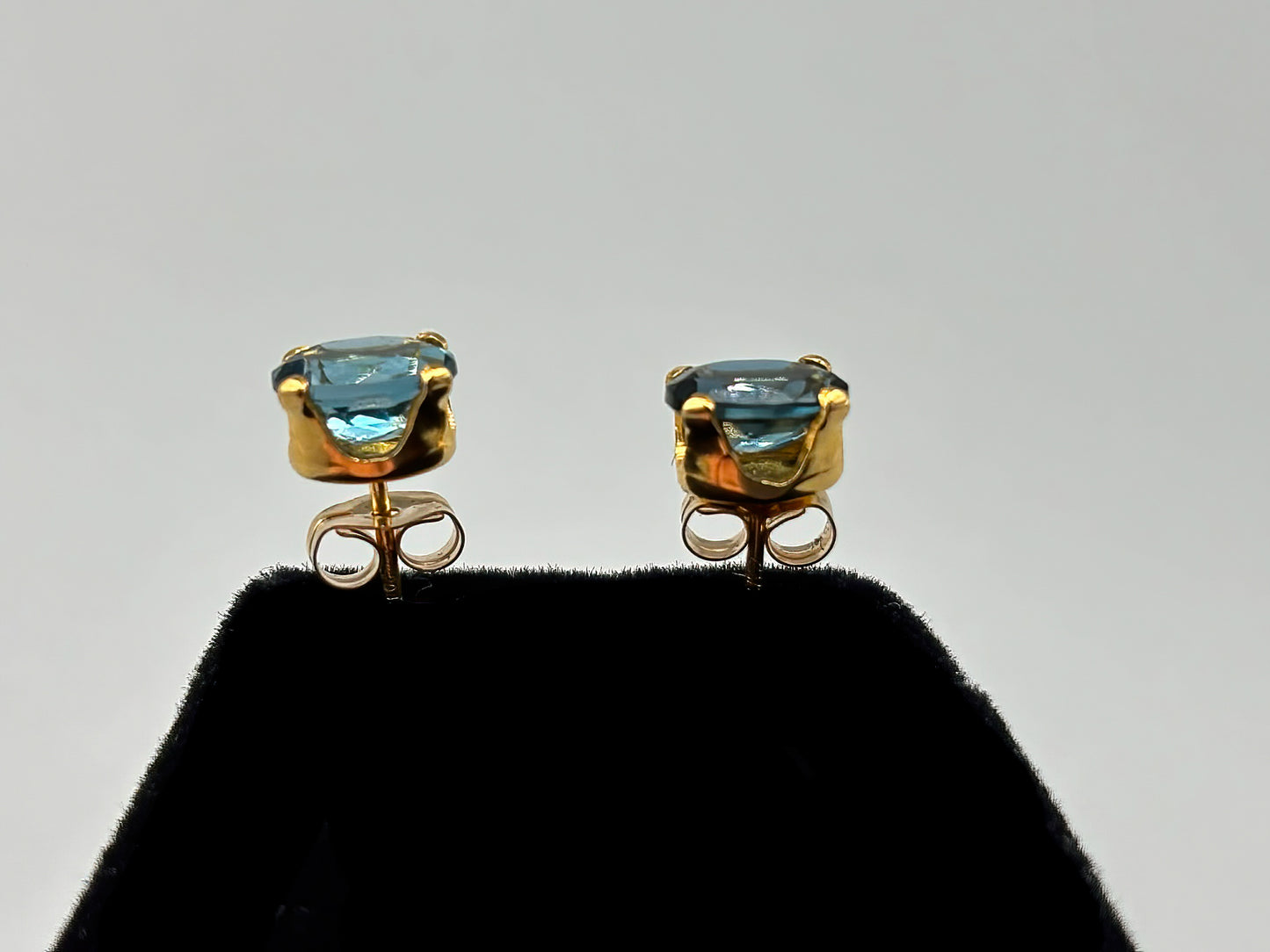 Oval London Blue Topaz set in 14K gold fill posts