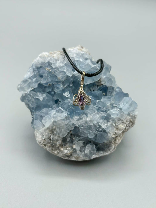 Petite Amethyst Nestled in a Sterling Silver Cage