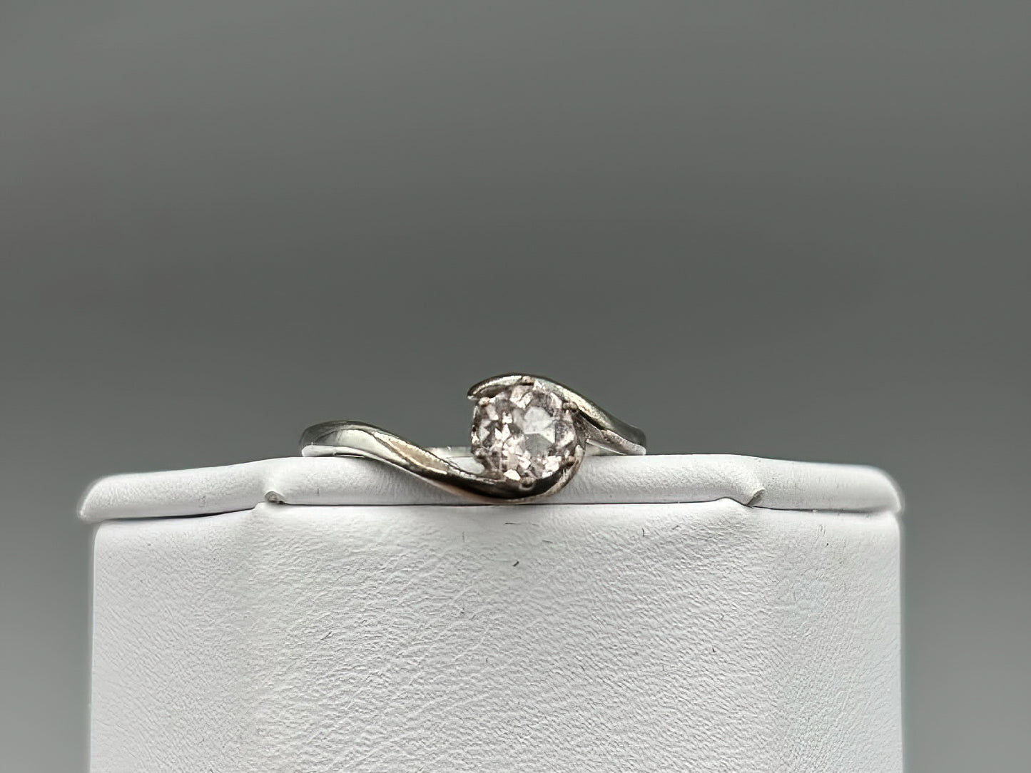 5mm Pink Morganite Facet set in a sterling silver bypass ring setting, Size 7