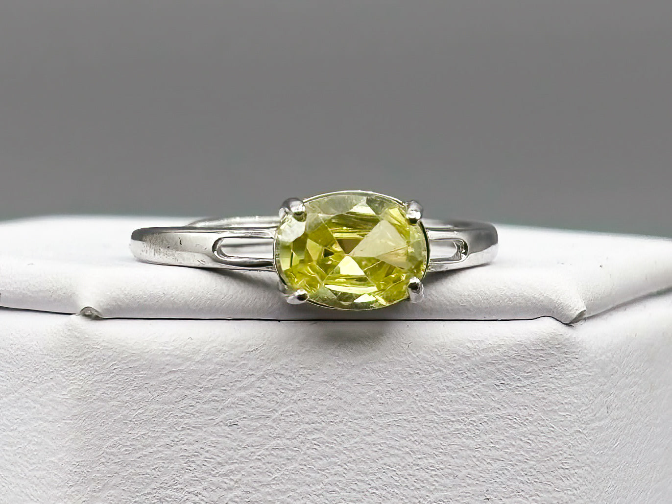 Yellow Green Cubic Zirconia set in adjustable sterling silver band