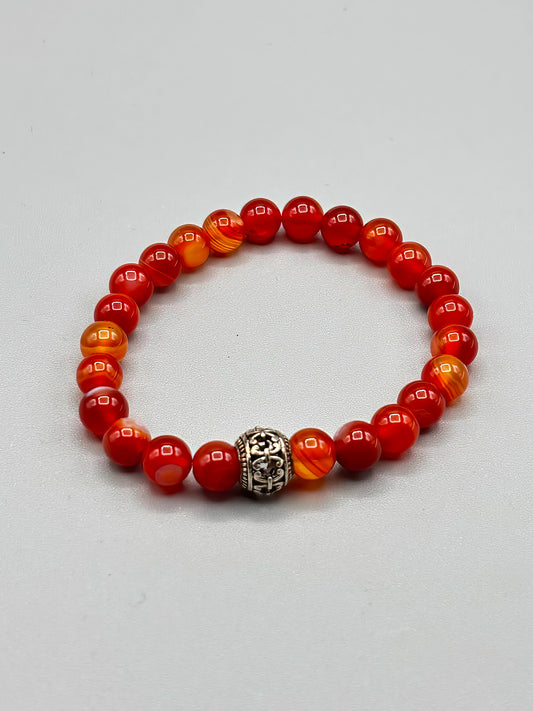6mm Carnelian beaded bracelet with Tibetan Silver bead, 7 1/2 inches