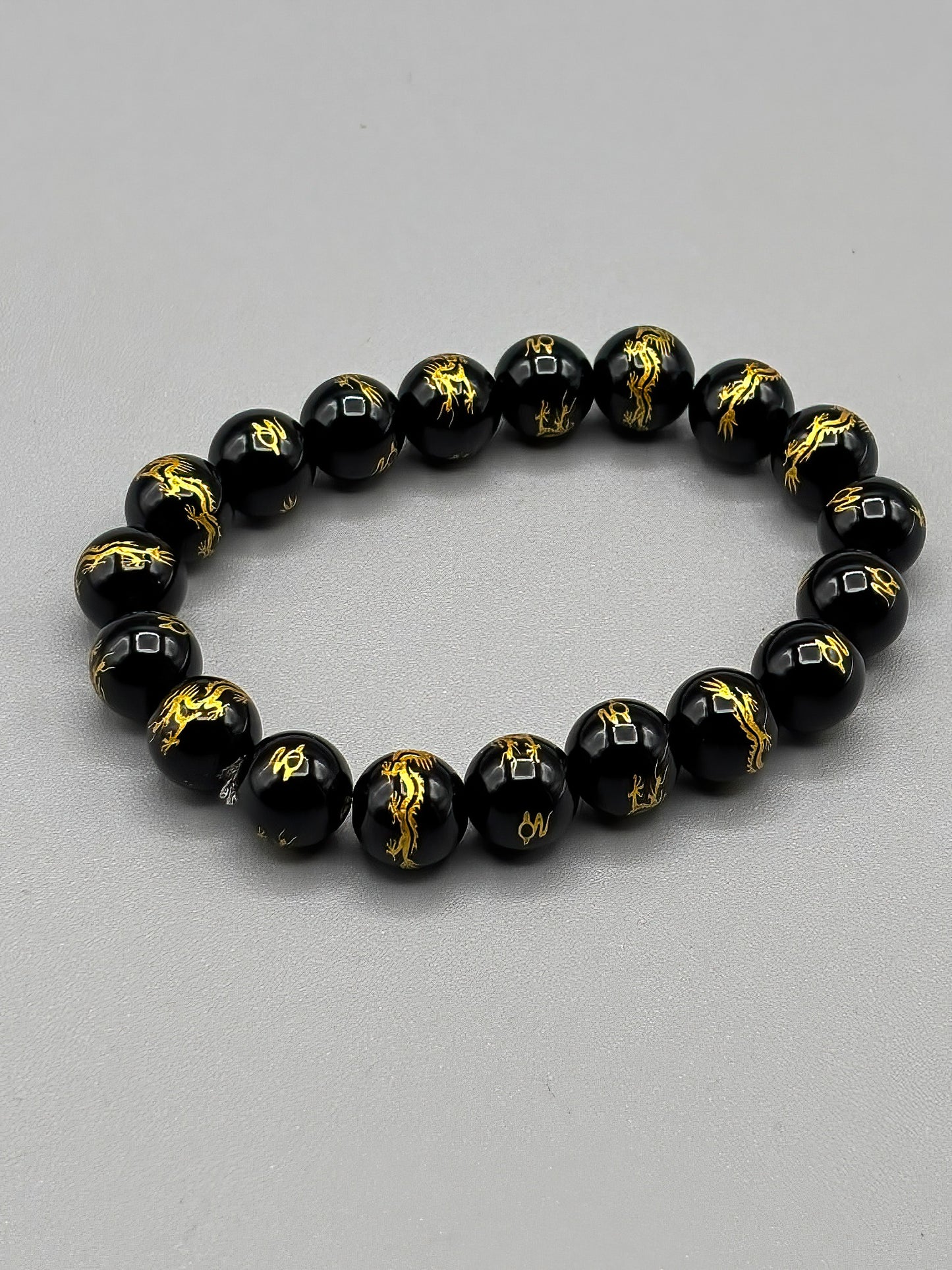 10mm Carved Black Onyx Beaded Bracelet